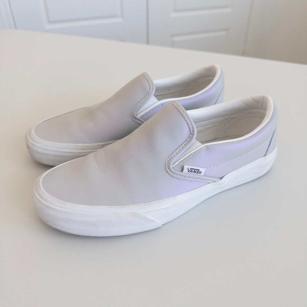 Vans Slip-On Sneakers in White with Iridescent Lavender Accent